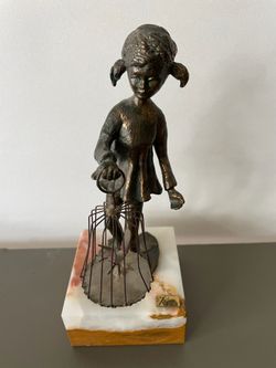 Bronze Statue:  Girl Holding Bird