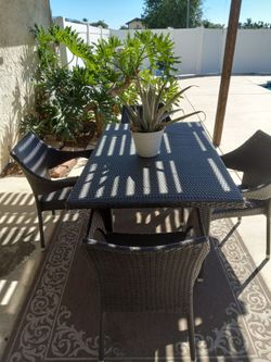 Brown Wicker Outdoor Table & Chairs