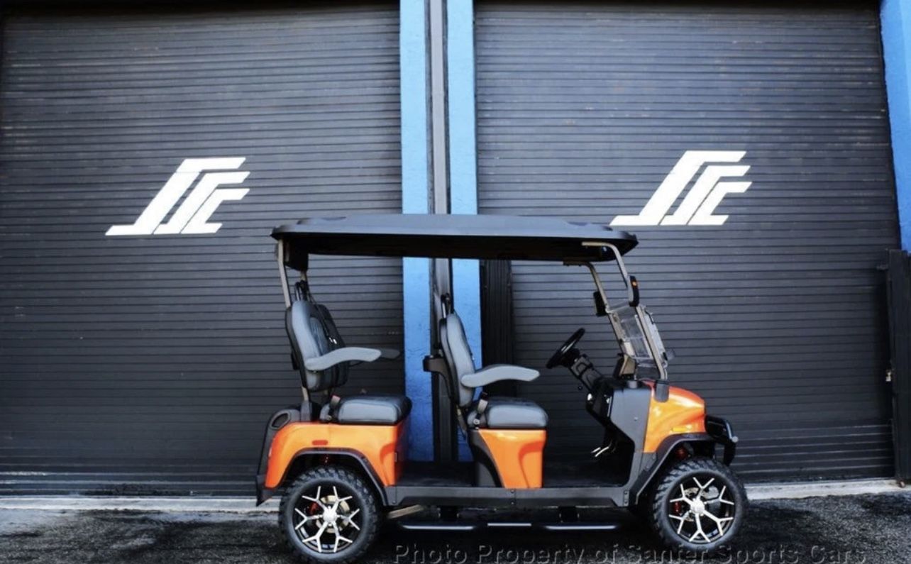 2025 Denago Rover EL Lava Orange Charcoal Diamond Stitched Forward Facing Seats