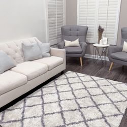 Sofa, Two Gray Arm Chairs, Carpet. Mini Table