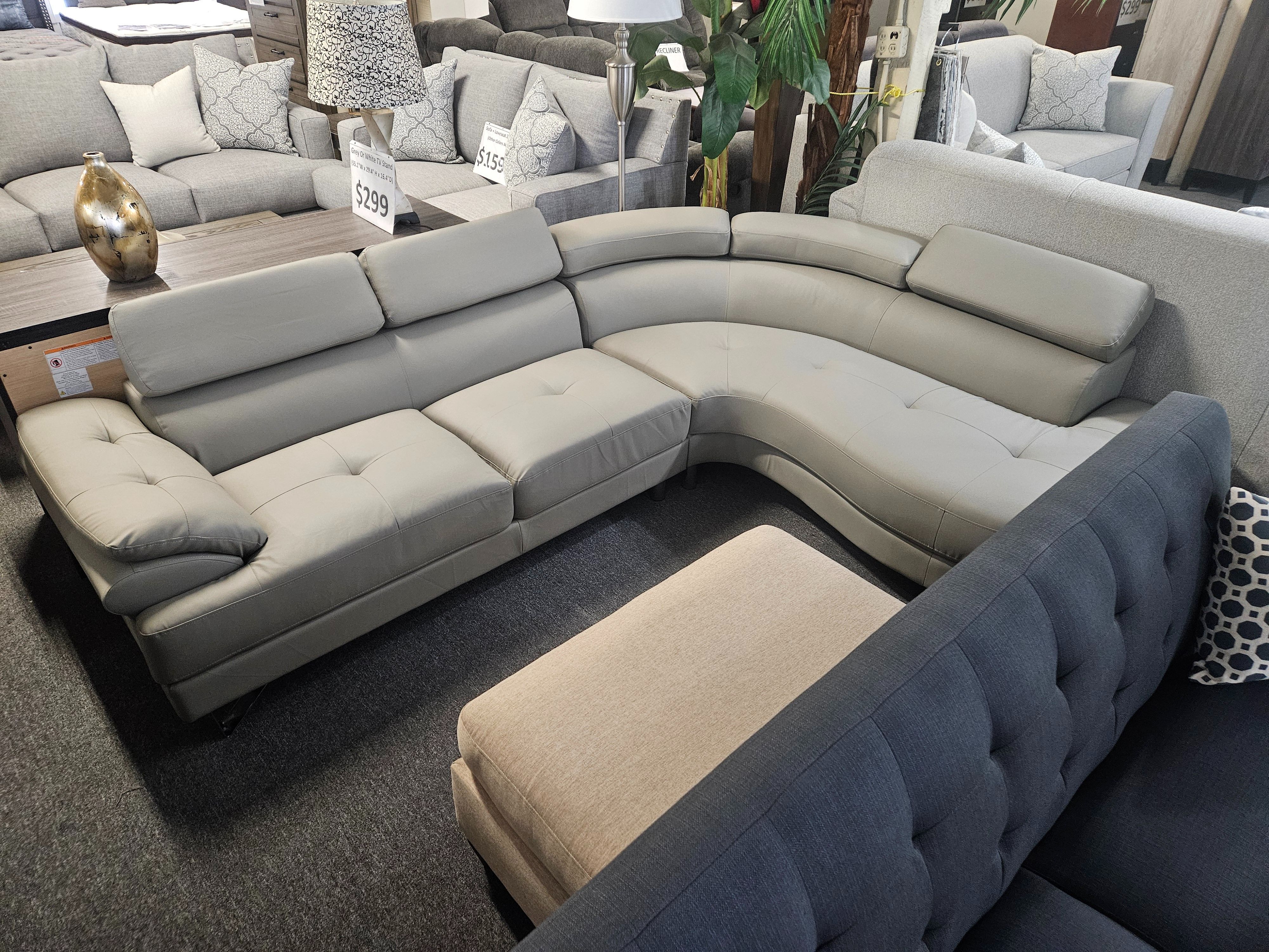 Brand new gray synthetic leather sectional
