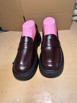 Brown leather loafers