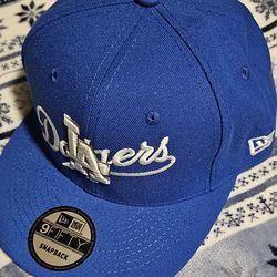 Snapback hats  $20 (Dodgers, Yankees,  Guardians