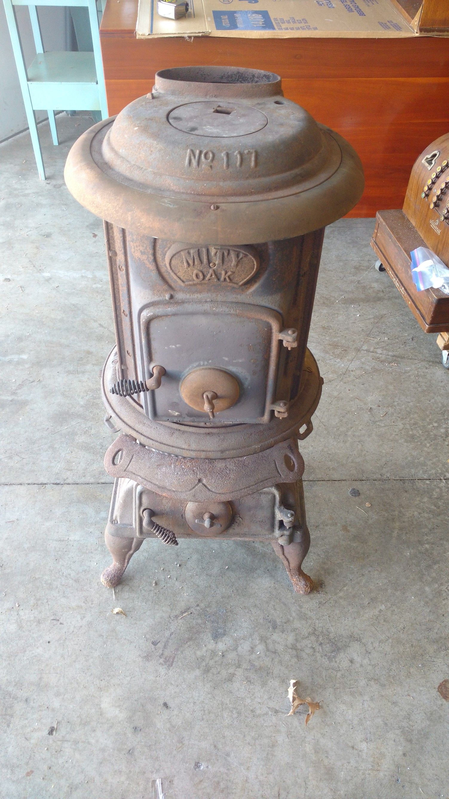Antique Cast Iron Mity Oak Potbelly Stove