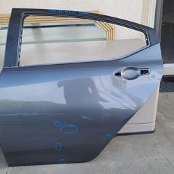 2020 - 2025 NISSAN VERSA LEFT REAR DOOR SHELL USED OEM .YD