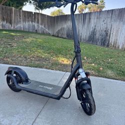 Used it in good working conditions TOMOLOO Electric Scooter for Adults 12" Plus Tires 50 Miles Long