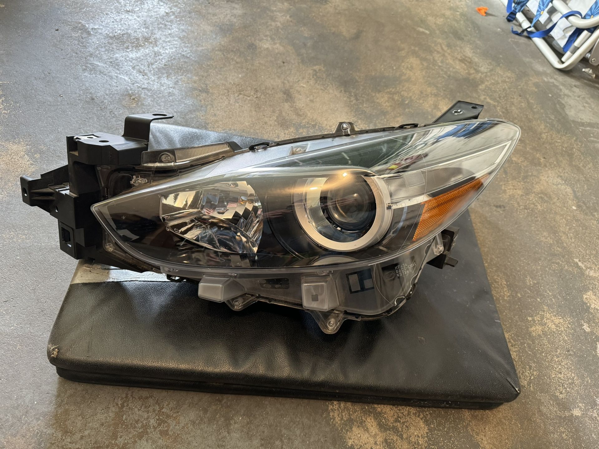 2014-2019 Mazda 3 headlight Left Side driver.