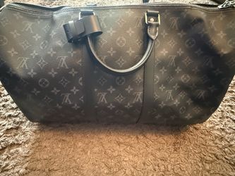 Louis Vuitton Keepall 50, 55, and Discovery Backpack