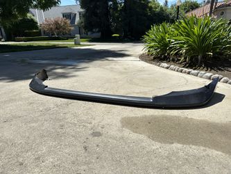 EVO X OEM Phantom Black Stock front Lip. $100.00