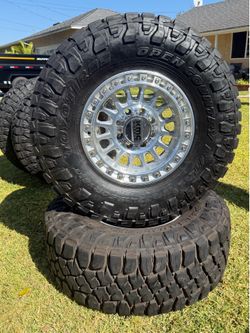 KMC Wheels with Toyo Open Country R/T Tires size 37x13.50R18LT