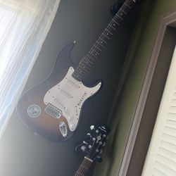 Electric Guitar 200$ Acoustic Guitar 70$