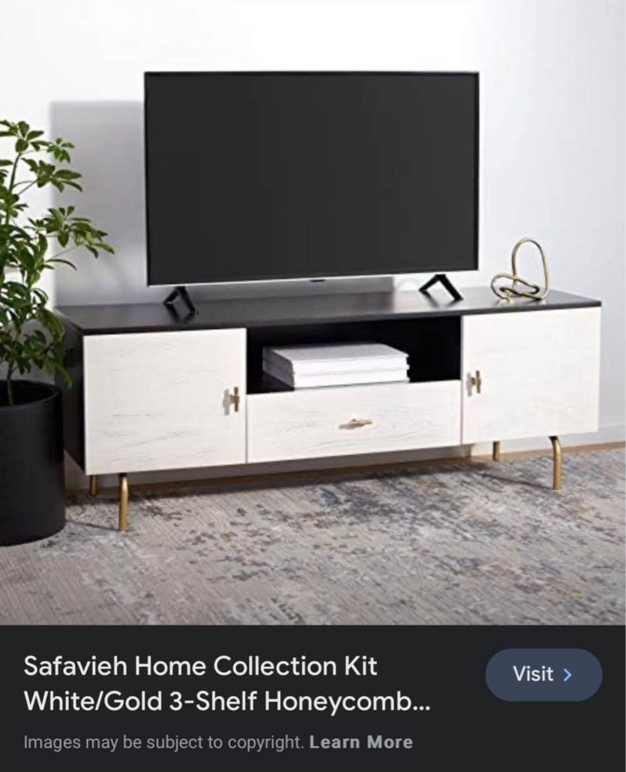 Black, white and gold wood TV stand