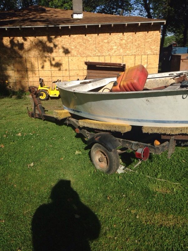 Old sailboat older on trailer