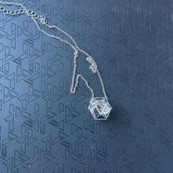 Faux diamond in metal cage necklace