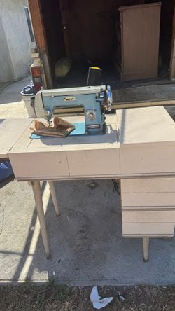Vintage Sewing Machine with cabinet