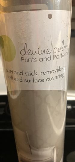Brand new gray stick on wallpaper almost 28’ x 2’ wide