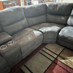 2 piece sectional couch w/ recliner seats on both ends
