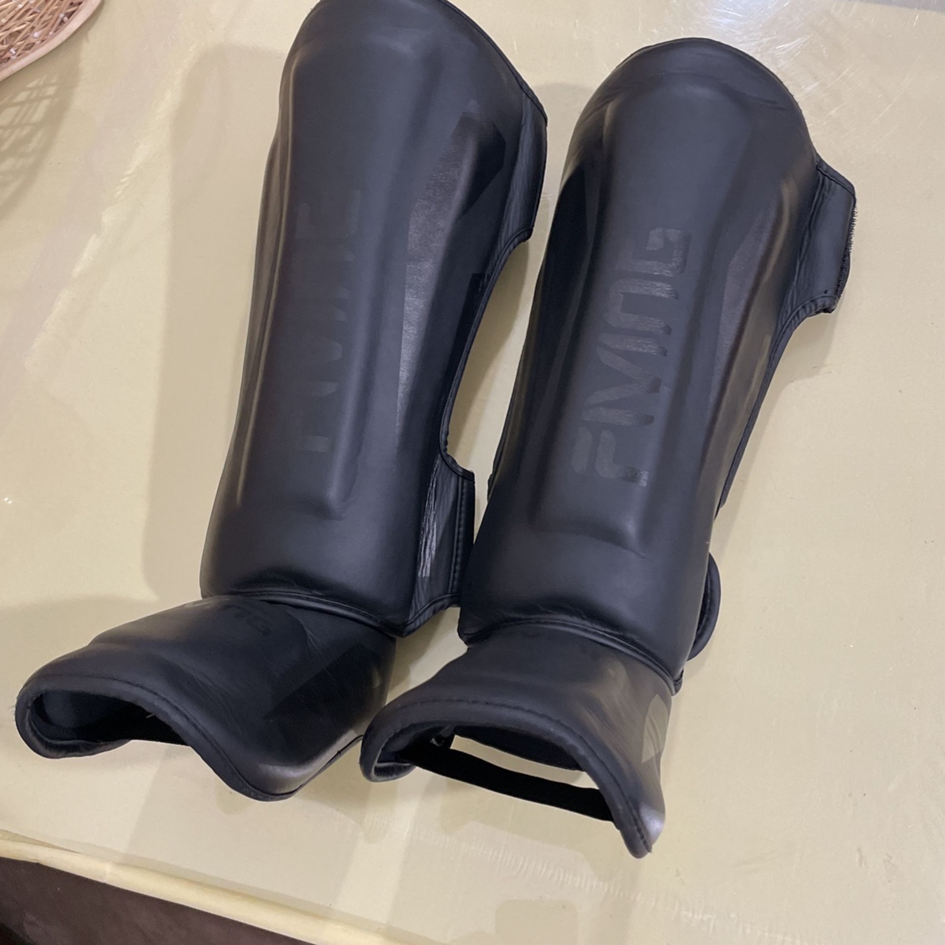 1 Pair Of 10oz Muay Thai Gloves And 1 Pair Of Size Small Shin Guards And 1 Pair Of Hand wraps