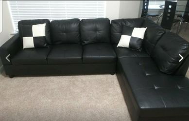 New Black Sectional with Storage Ottoman