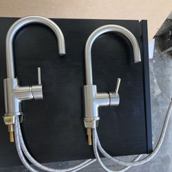 Two Single Hole Faucets 7 in tall