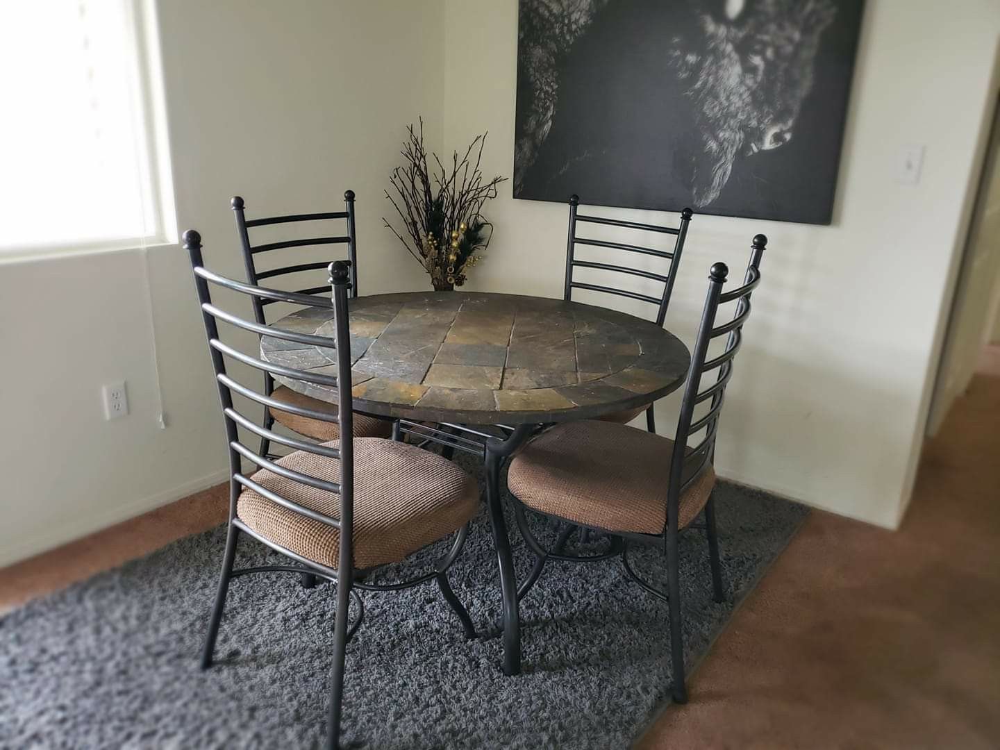 For sale. Ashley Furniture Antigo Round Fixed Slate Table. for Sale in