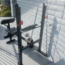 Nice  Bench, Bar, 100 lbs of Weights, Attachments