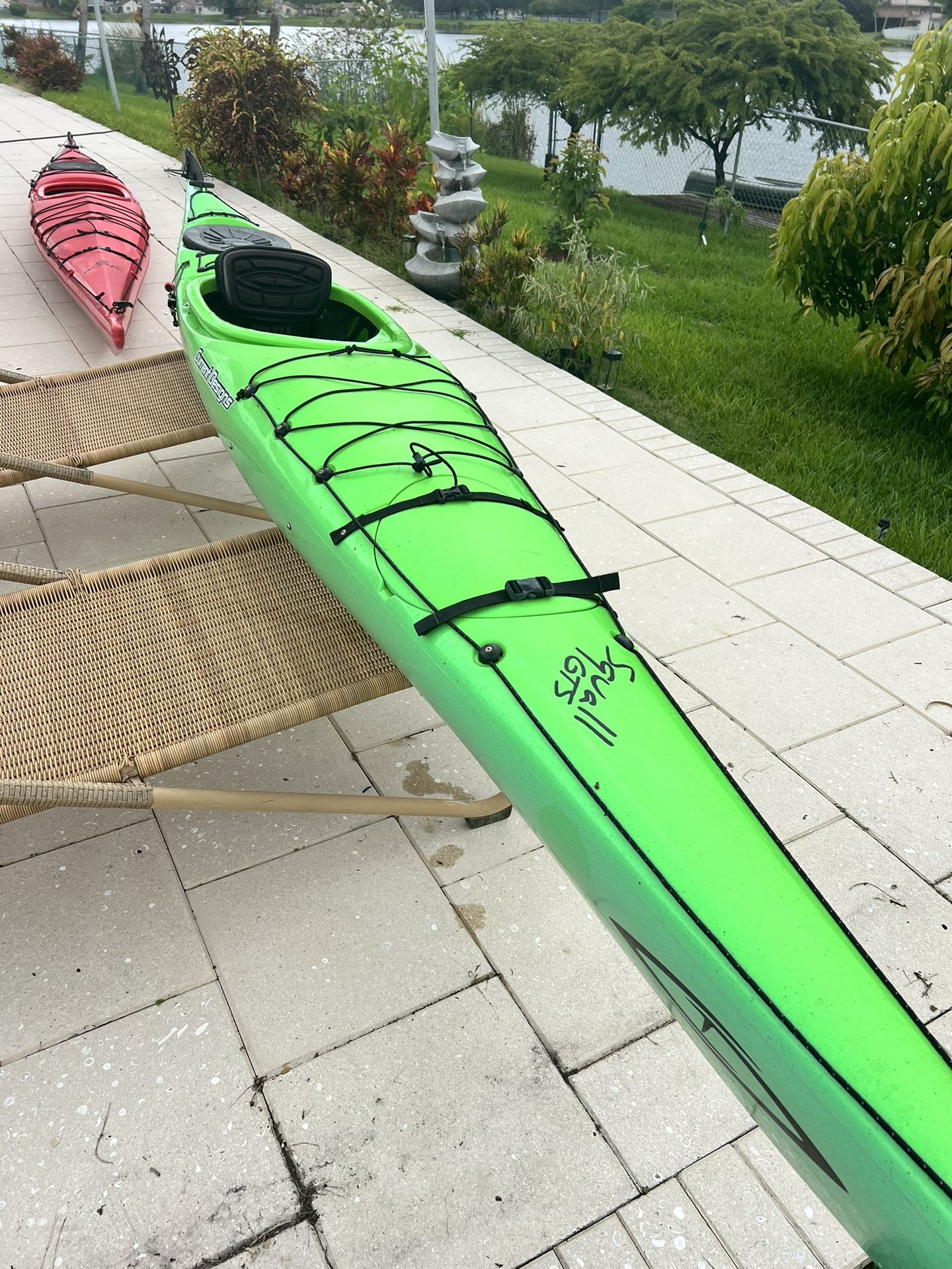 2 Current Designs Kayaks, Red Storm GT and Green Squall GTS