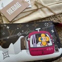 Authentic 💯 Mini pochette Limited Edition