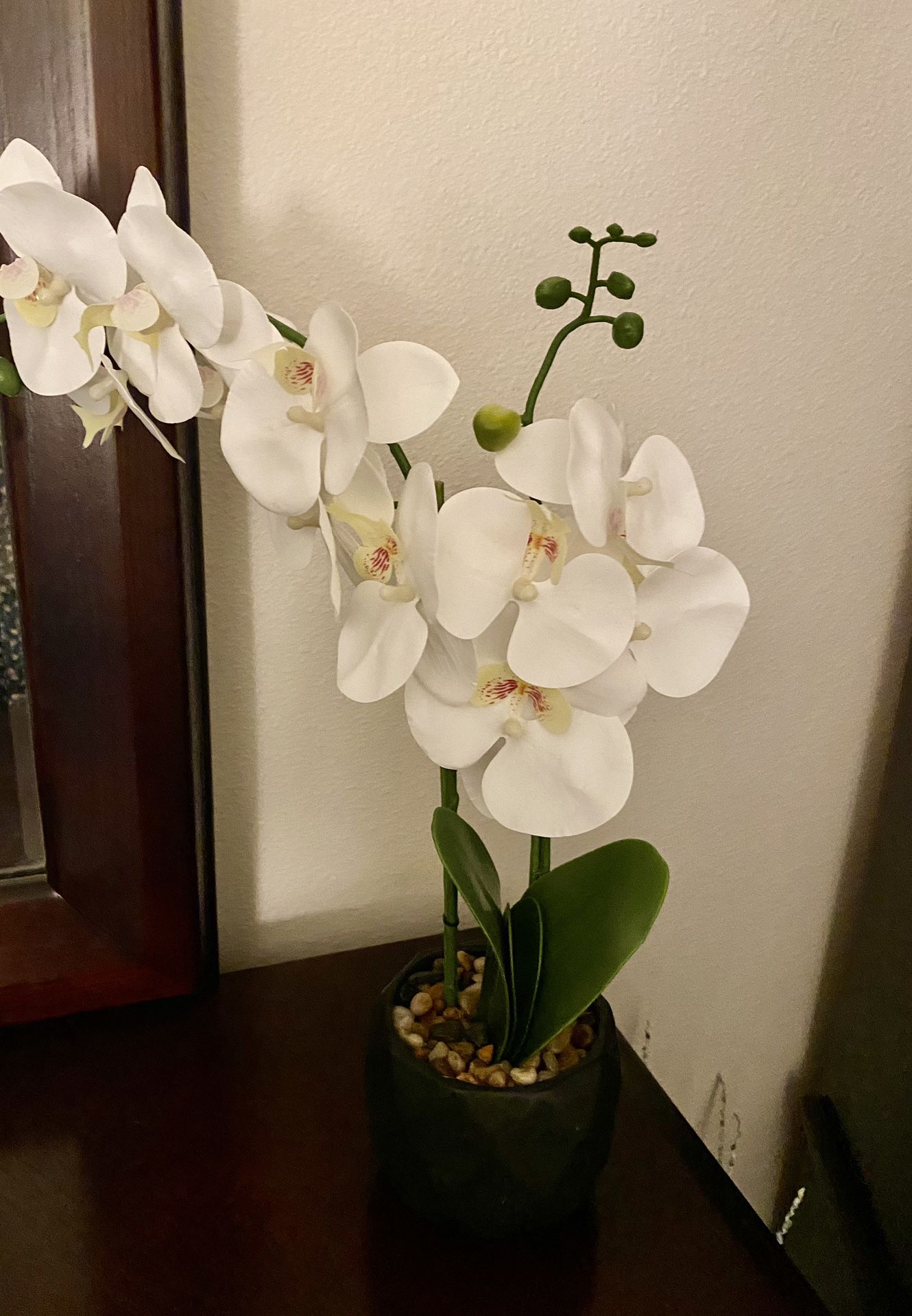 Faux White orchids On A Black Matte Ceramic Pot 