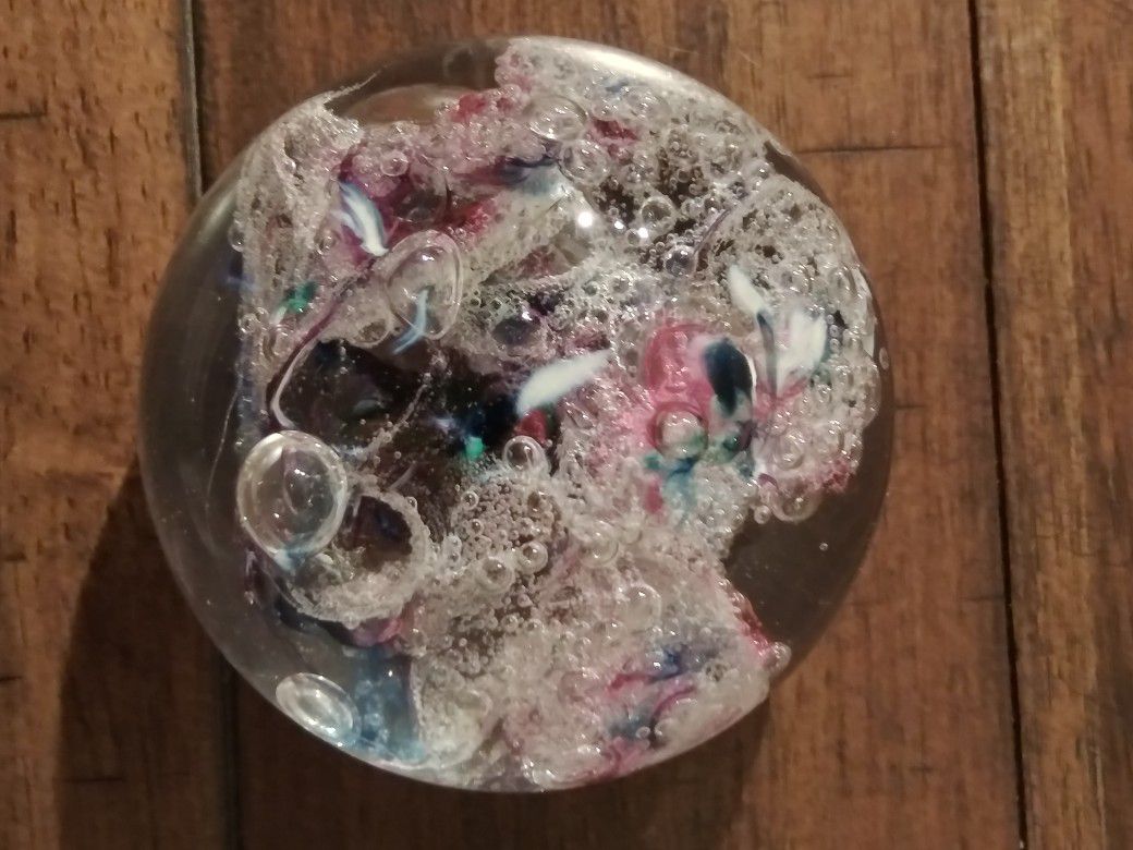 Glass Paperweight with a variety of art Entries.