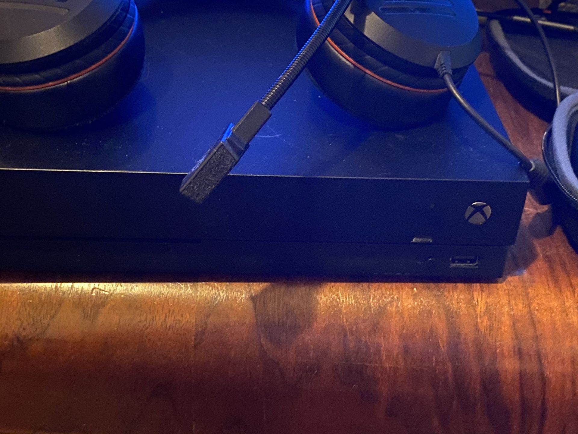 Xbox one x with controllers and headset
