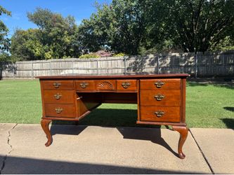mahogany writing desk features classic Queen Anne style legs