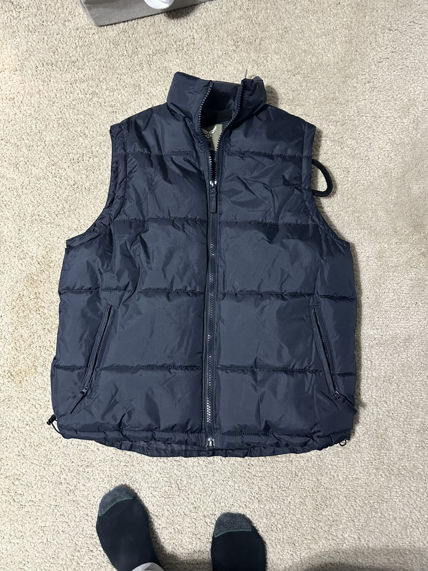 Sleeveless Puffer Cost