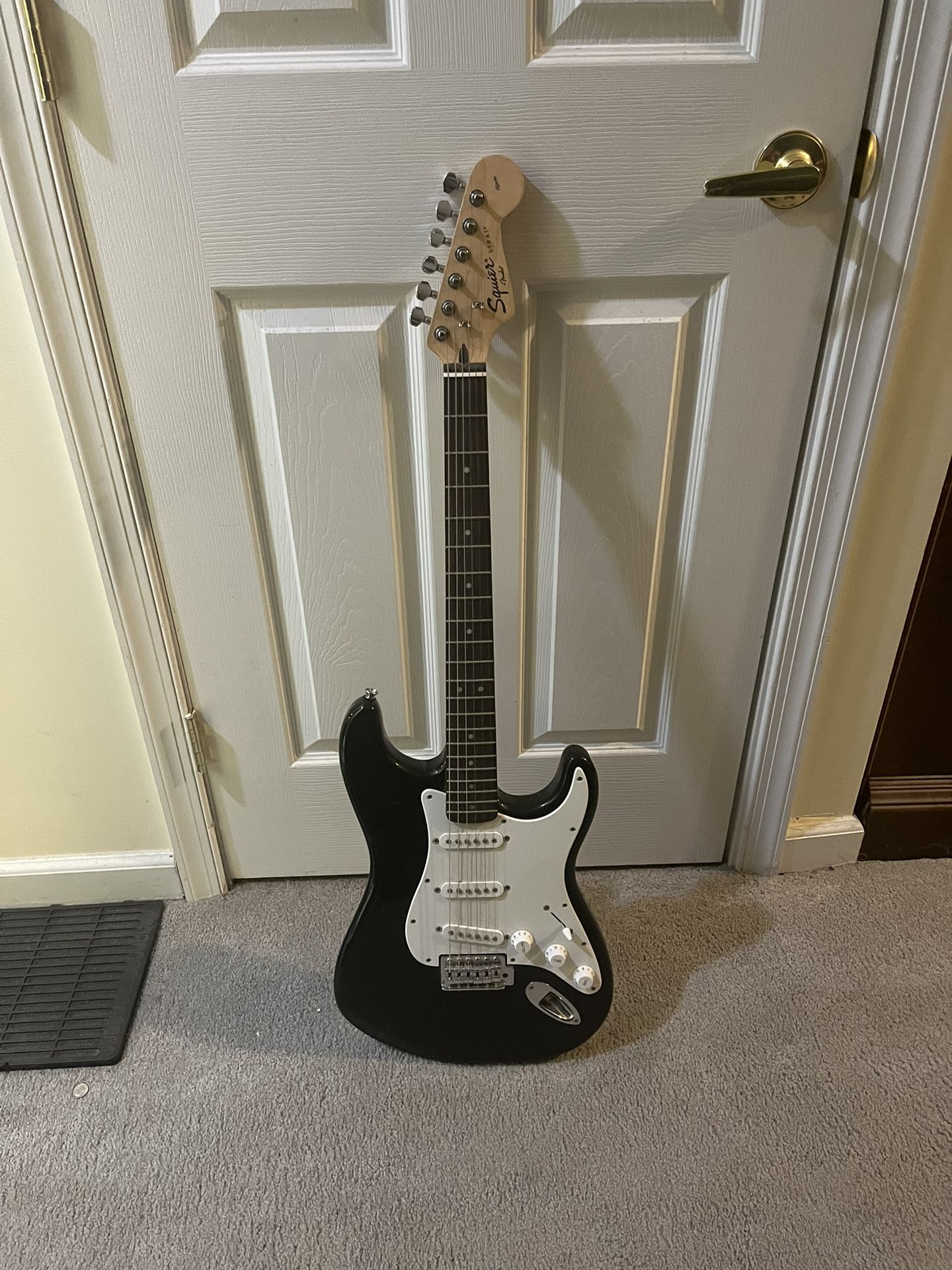 Black and white electric guitar