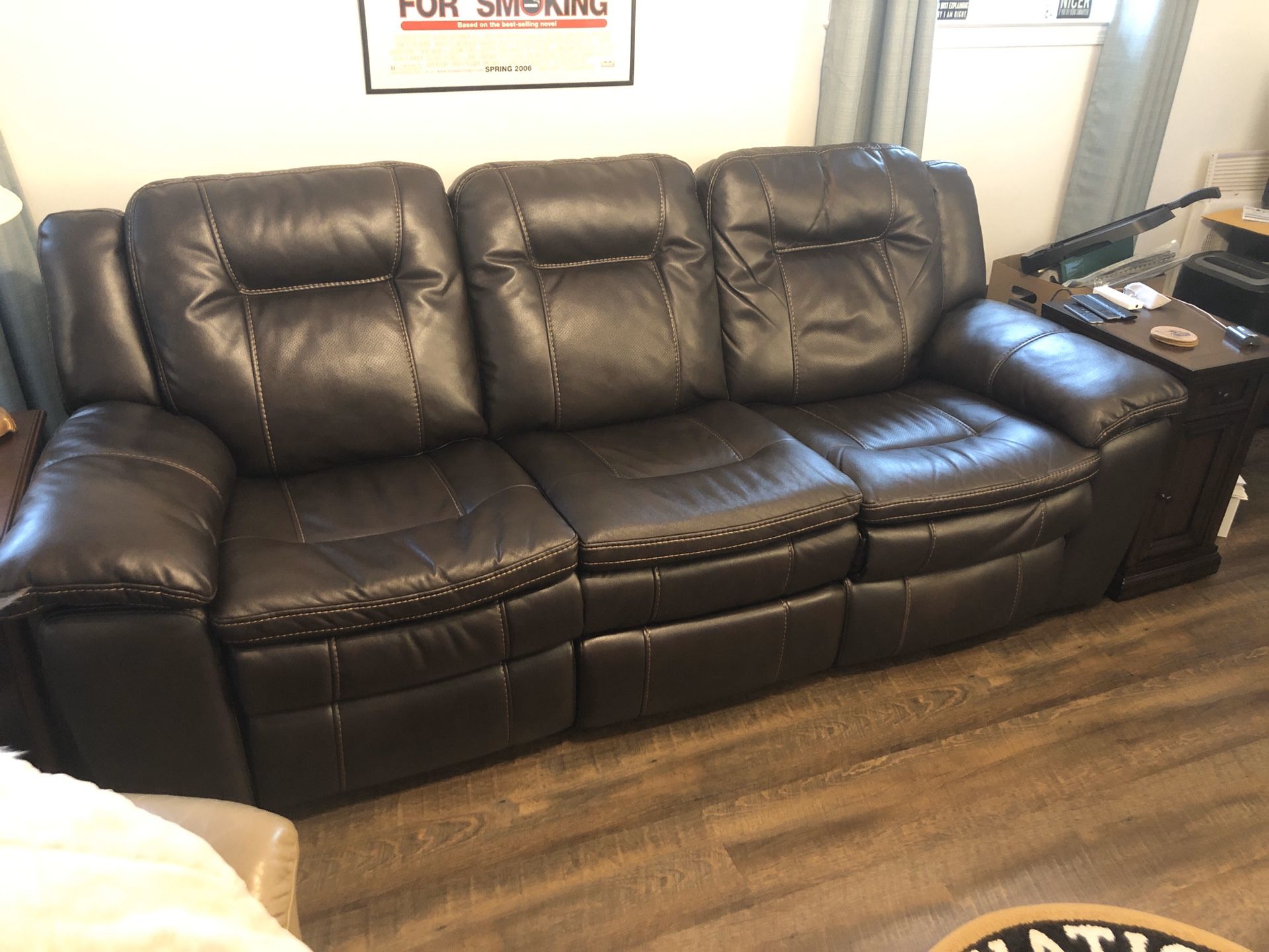 Brown leather reclining couch