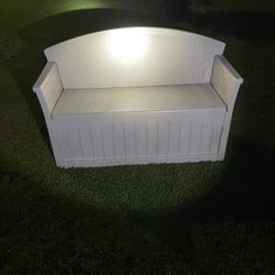 Brand new hard, plastic bench, and storage