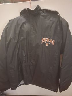 black, full-zip Texas Longhorns windbreaker jacket with an embroidered burnt orange