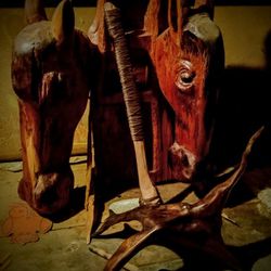 A Pair Of Two Horse Head Carvings