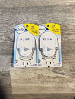 Febreze Plug Scented Oil Warmer $2.50 Each