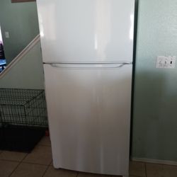 New Never Used Frigidaire Refrigerator With Freezer On Top 32 W. 30 Dm 66 H.