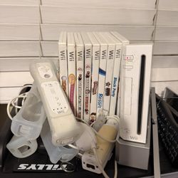Wii w/ Games And Extended Battery Controllers w/ Joysticks