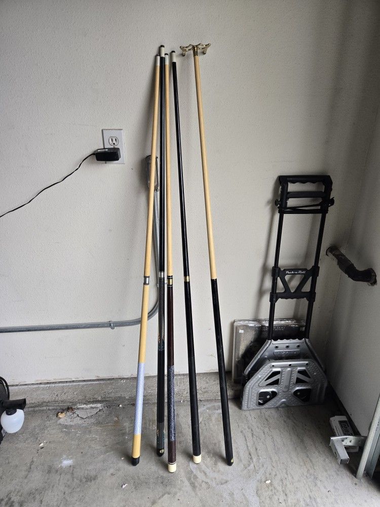 Set of 4 Pool Cues + Bridge Stick – $60