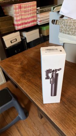 Selfie stick tripod with remote shutter