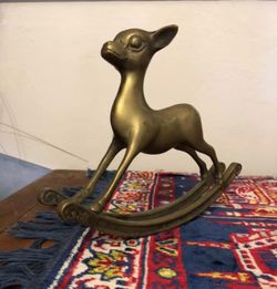 Adorno venado mecedor bronce