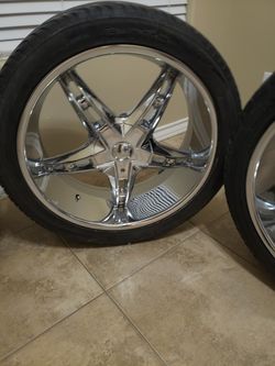 22" rims with tires.