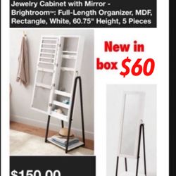 New in box  jewelry cabinet with  mirror white $60cash only see pictures for description Plz don't waste my time asking if you're not interested..Cash