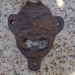 Rare vintage cast iron devil head bottle opener