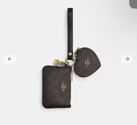 Coach wristlet and heart pouch