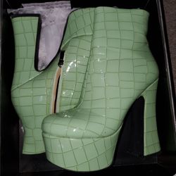 Alazea Wang green faux crocodile heeled boots