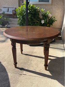 Round Walnut Dining Table